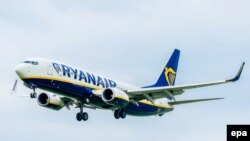 Belgium -- A Boeing 737-8AS airplane of Irish low-cost carrier Ryanair approaches for landing at Brussels National Airport, April 21, 2017.