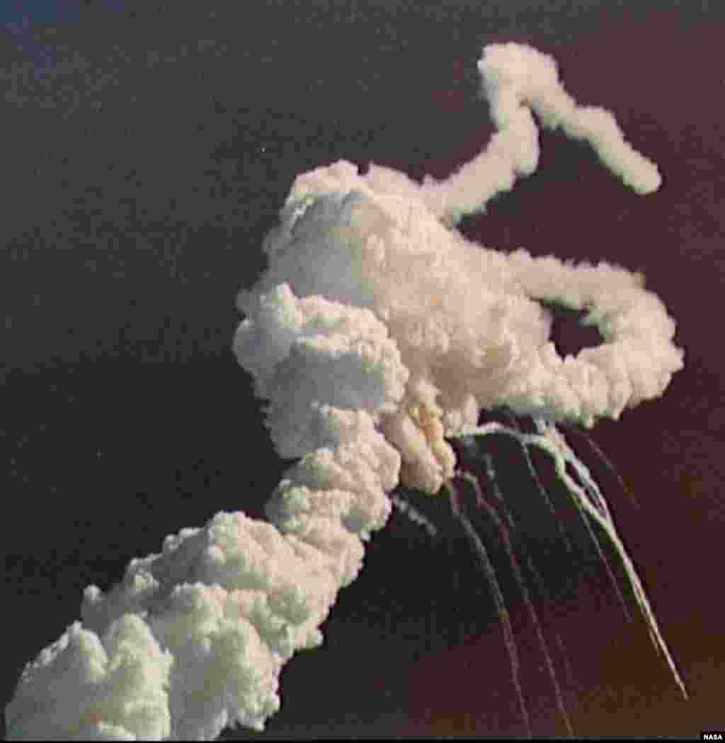 The U.S. space shuttle "Challenger's" smoke plume after its breakup 73 seconds after launch on January 28, 1986, killing all seven crewmembers.