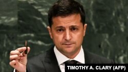 Volodymyr Zelensky holds a bullet as he addresses the 74th session of the United Nations General Assembly. In his speech, the Ukrainian president warned world leaders about the dangers of "Russian aggression" in his country.