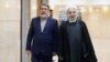 حسن روحانی در کنار وزیر کشور ایران صبح دوشنبه در ستاد انتخابات