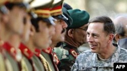 General David Petraeus meets with Afghan National Army soldiers prior to a meeting with the Afghan defense minister in Kabul in November.