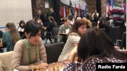Iranian chess champion, Mitra Hejazipoor playing at Moscow World Rapid & Blitz Championship. 