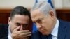 Israeli Prime Minister Benjamin Netanyahu (R) and Israel Katz (L).
File photo 