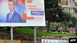 Election posters on the main street of the eastern Bosnian town of Srebrenica