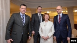 European Union foreign policy chief Catherine Ashton (second from right) meets with Ukrainian opposition leaders Arseniy Yatsenyuk (right), Vitali Klitschko (second left), and Oleh Tyahnybok (left) in Kyiv on February 4.