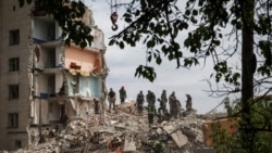 Rescuers clearing the rubble of a five-story residential building in which more than 40 people were killed by a Russian military strike in the town of Chasiv Yar, in Ukraine's Donetsk region on July 10.