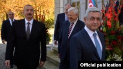 Switzerland - Presidents Serzh Sarkisian (R) of Armenia and Ilham Aliyev of Azerbaijan begin negotiations in Geneva, 16Oct2017.