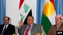 Kurdish leaders Iraqi President Jalal Talabani (center) and Kurdish region President Masud Barzani (right) may consider the offer of Iraqi Prime Minister Nuri al-Maliki.