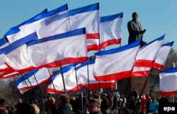 Pro-Russian demonstrators rally in Crimean capital, Simferopol, in February last year.