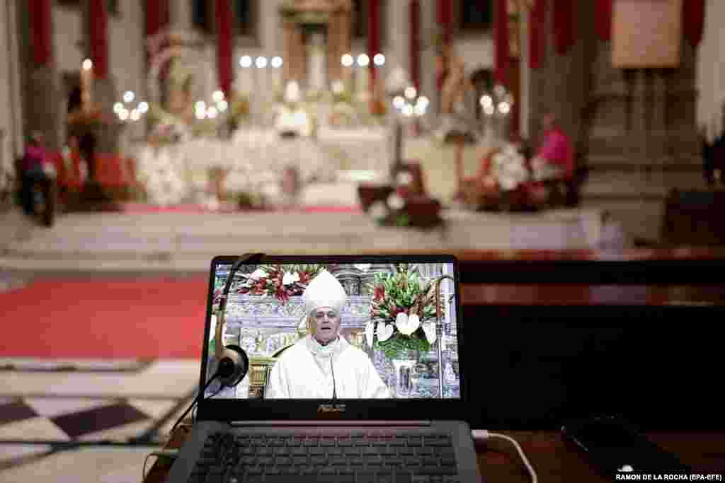 The Bishop of Tenerife, Bernardo Alvarez, holds an online Easter Saturday Mass at the Cathedral of San Cristobal de La Laguna in Tenerife, Spain. (epa-EFE/Ramon De La Rocha)&nbsp; &nbsp;