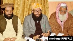 FILE: Pakistani Senate Deputy Chairman Maulana Abdul Ghafoor Haideri (C) during a press conference in Quetta in March 2015