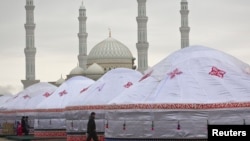 Yurts in front of the Khazret Sultan mosque during the Norouz celebration in Astana.