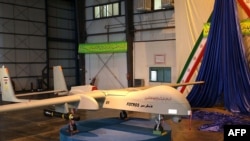 The Iranian-made missile-equipped "Fotros" drone is unveiled during a ceremony in Tehran on November 18. 