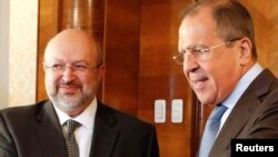 OSCE Secretary-General Lamberto Zannier (left) and Russian Foreign Minister Sergei Lavrov at a meeting in Moscow in June.