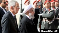 Австрия президенті Александр ван дер Беллен мен Иран президенті Хассан Роухани. Вена, 4 шілде 2018 жыл.