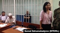 Japarov Sadyr in the defendant's cage in a Bishkek courtroom