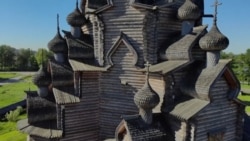 Wooden Village Rises Around Rebuilt Russian Cathedral