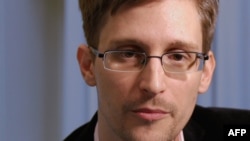 U.S. intelligence leaker Edward Snowden gives a television Christmas message on December 24, 2013.