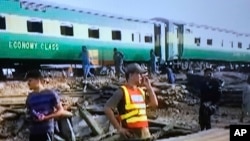 The engine of the Akbar Express appeared to be destroyed and at least three carriages were derailed in the collision. 