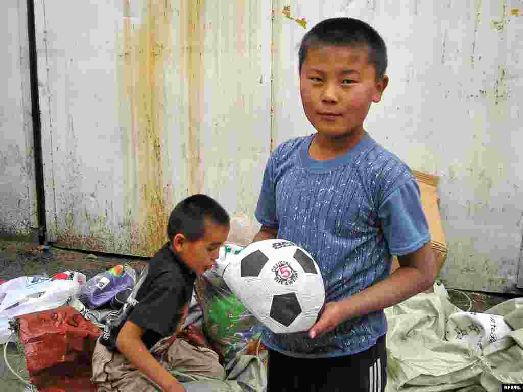 A boy from Kyrgyzstan at the central market in neighboring Kazakhstan's second city, Almaty, where he says he earns 200 tenges (about $1.20) for every container of goods he moves (RFE/RL) - Although the number of children aged 5-17 engaged in labor is falling, the figure is still well over 200 million. Each year, 22,000 children are killed at work, while 6 million are injured, and 2.5 million are disabled.