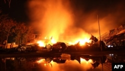 Firefighters extinguish battle a fire at the Viktoria children's camp in Odesa on September 16.