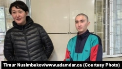 Asiya Tulesova (left) and Beibarys Tolymbekov before their trial at court in Almaty on April 21.