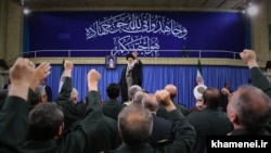 Iran - Supreme Leader Ali Khamenei waves to the commanders of Revolutionary Guards during a meeting in Tehran on September 18, 2016.