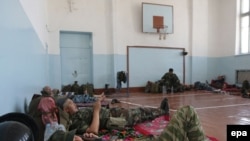 Kyrgyz police were deployed in a school in Osh on June 21.