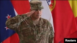 NATO/ISAF Ceremony in Kabul marks the end of combat missions.