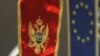U NATO nisu željeli da komentarišu činjenicu da je Crna Gora jedina država članica Alijanse koja nije usvojila sankcije protiv Rusije (na fotografiji: zastava Crne Gore i EU)