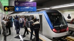 "In the subway, you need to pay with a bank card. They don't accept cash," an Afghan said.. "Some [Iranians] buy tickets for us [in exchange for cash], but others don't."