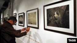 Activists calling themselves the Officers of Russia blocked a Jock Sturges exhibition in Moscow to protest what they characterized as child pornography.