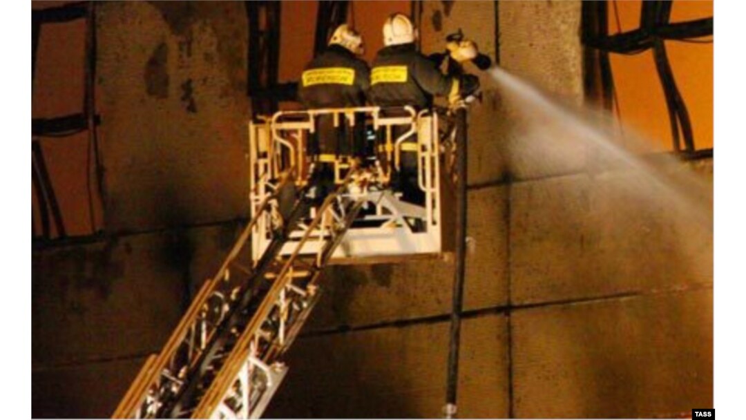 Firefighters battle the warehouse blaze.