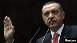 Turkish Prime Minister Recep Tayyip Erdogan, addressing members of parliament on June 26, said the Turkish military will respond to any future violations of its border by military units from Syria.