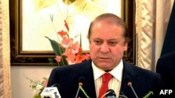 Pakistani Prime Minister Nawaz Sharif delivers a policy statement on Yemen in Islamabad on April 13.