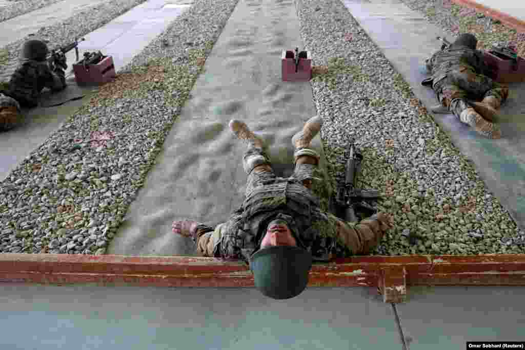 Afghan National Army soldiers take part in a training exercise at the Kabul Military Training Center. (Reuters/Omar Sobhani)