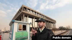 Police man the main gate of Iran's state broadcaster, IRIB. File Photo