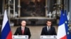 France -- French President Emmanuel Macron (R) and Russian President Vladimir Putin look on during a joint press conference following their meeting at the Versailles Palace, near Paris, May 29, 2017