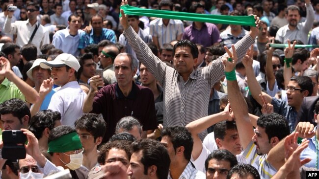 Iranian opposition supporters protest in Tehran after Ahmadinejad's election victory in July 2009.