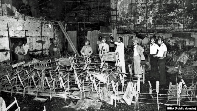 Fire fighters standing inside Rex Cinema in the southern city of Abadan, after the fire that killed hundreds on 19 August 1978.