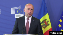 Moldovan Prime Minister Pavel Filip speaks at a recent press conference at EU headquarters in Brussels.