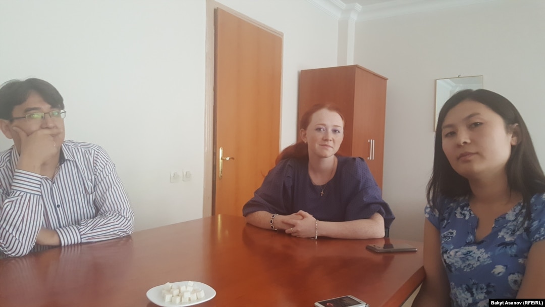 Teacher Nurdin Kaparov (left) with a couple of his students at the Gulen-funded Ataturk Alatoo University in Bishkek