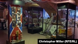 Portraits of slain Russian commanders and artifacts from the war in eastern Ukraine on display inside the Museum of Military Valor of Donbas in St. Petersburg.