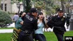 Azerbaijan -- Police arrested more than 50 young people who demanded to cancel Flower Holiday in Baku, 10May2009