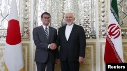 Iranian Foreign Minister Mohammad Javad Zarif meets with Japanese Foreign Minister Taro Kono in Tehran, Iran June 12, 2019. Hamed Malekpour /Tasnim News Agency/via