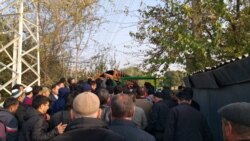 The funeral ceremony in Dushanbe of a Tajik border guard killed in the attack.