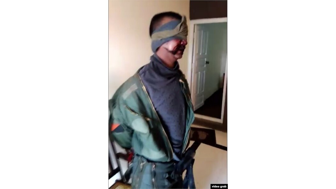 One of the two Indian pilots said to have been captured by Islamabad is seen being questioned by Pakistani authorities.
