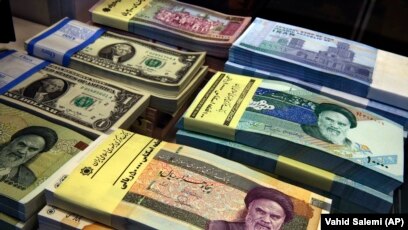 Iran S Rial Hits New Low Against Dollar As U Reimposes Nuclear Iran S Rial Hits New Low Against Dollar
