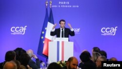 France - French President Emmanuel Macron speaks during the annual dinner of the Coordination Council of Armenian organizations of France (CCAF) on February 5, 2019, in Paris.