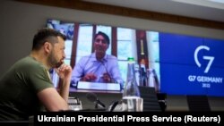 Ukrainian President Volodymyr Zelenskiy attends a working session of G7 leaders via video link in Kyiv on June 27.